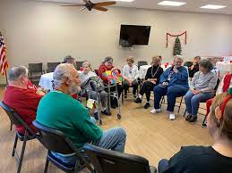 Senior citizens gathered inside of senior center