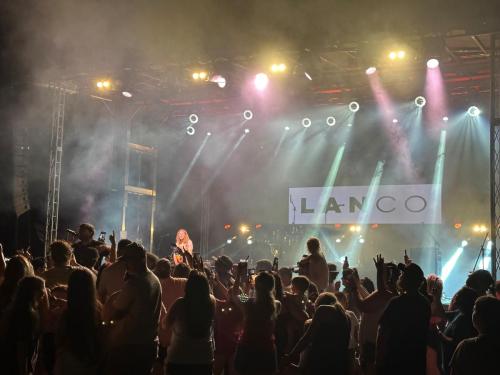 LANCO performing at night with lights on the SCHS Football Stage