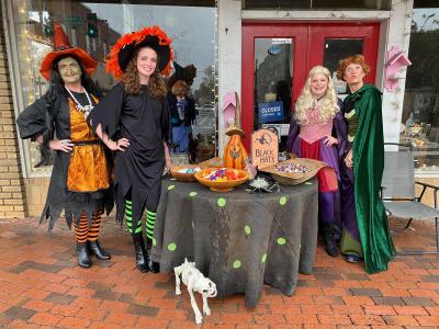 Personal Touch hair salon dressed as witches for halloween