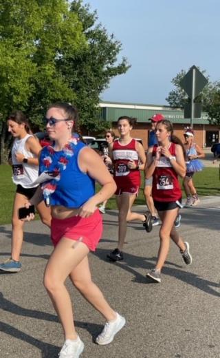Runners starting at the Liberty Day 5K in 2023