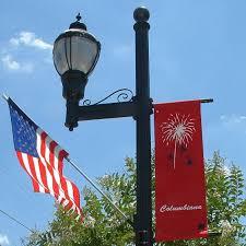 City street light with American flag and Liberty Day banner